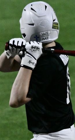 Ninety Nine customer with their glove
