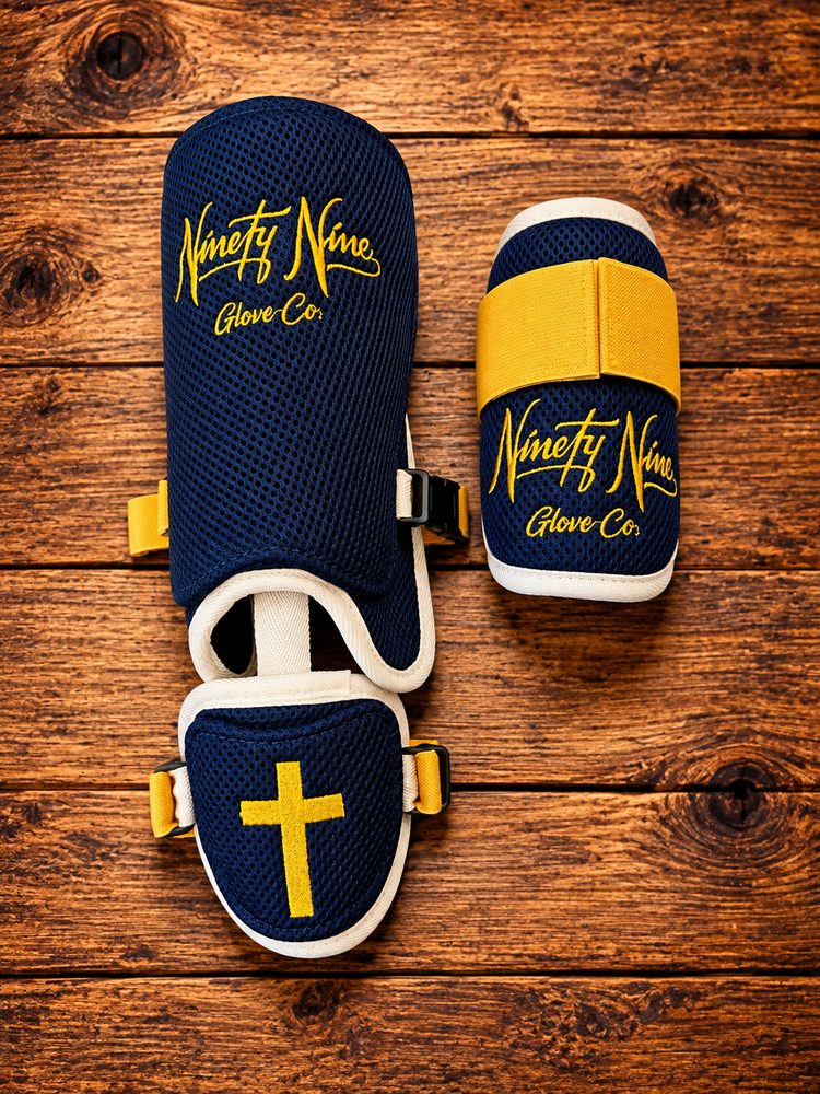 Ninety Nine Glove Co. custom leg and elbow guards, navy and gold